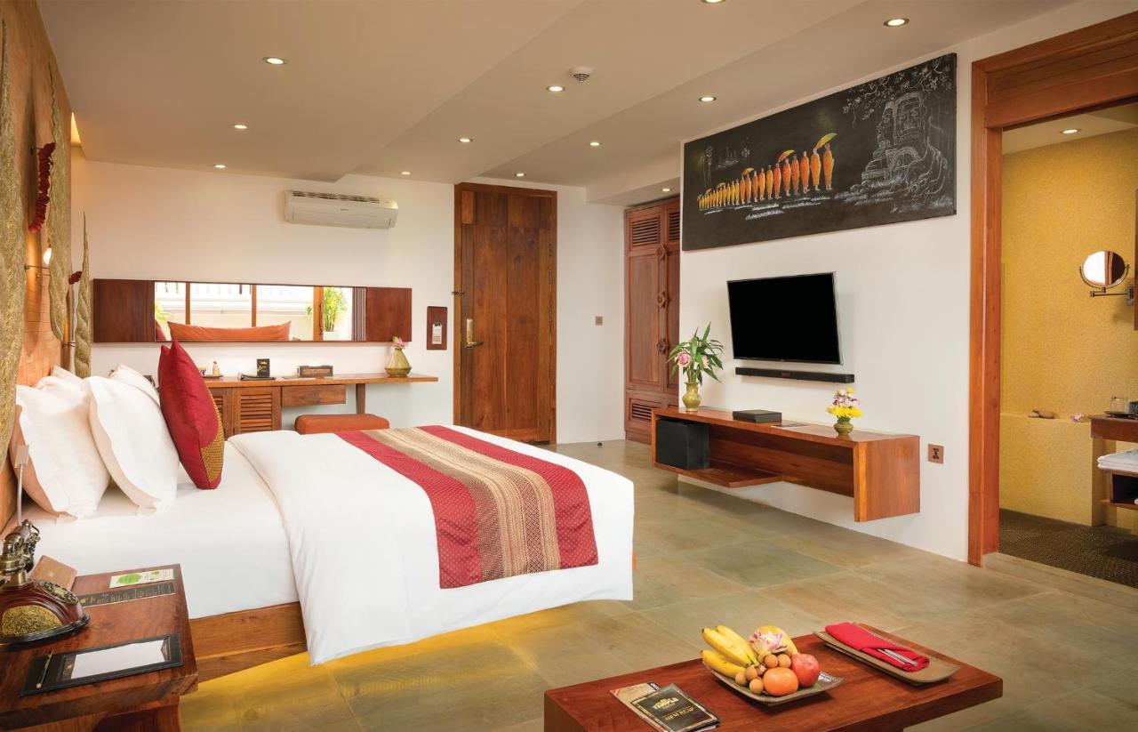 Golden Temple Residence Σιέμ Ρέαπ Εξωτερικό φωτογραφία A bedroom at the resort